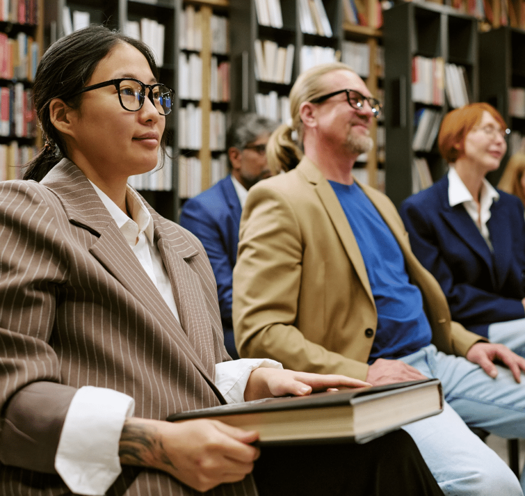 diverse-group-of-adults-attending-presentation