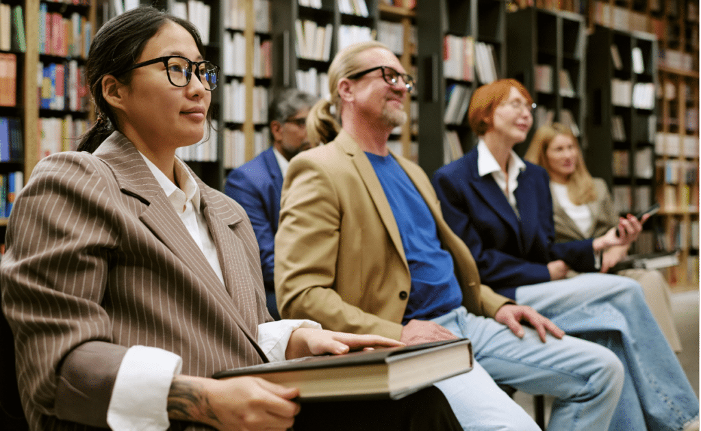 diverse-group-of-adults-attending-presentation
