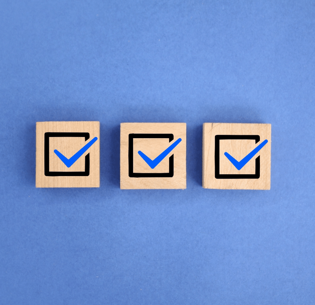 check-mark-on-blocks-on-blue-background
